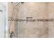 Close-up of a modern shower with a built-in niche and stylish tile at 3713 E Cat Balue Dr, Phoenix, AZ 85050