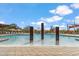Resort-style pool with unique design features, ample seating, and beautiful desert landscaping at 3713 E Cat Balue Dr, Phoenix, AZ 85050