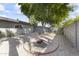 Scenic backyard featuring rock landscaping, gravel, and a circular rock feature adding character to the outdoor space at 4001 E Cannon Dr, Phoenix, AZ 85028