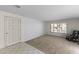 Bright living room features tile and carpet flooring at 4001 E Cannon Dr, Phoenix, AZ 85028