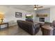 Inviting living room boasts a fireplace and cozy leather seating at 4001 E Cannon Dr, Phoenix, AZ 85028
