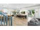 Spacious living room with hardwood floors, modern lighting, and comfortable seating areas for entertaining at 4216 N 42Nd St, Phoenix, AZ 85018