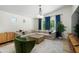 Comfortable living room with vaulted ceilings, large windows, and contemporary decor at 4216 N 42Nd St, Phoenix, AZ 85018