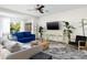 Inviting living room with hardwood floors, neutral tones, and a cozy seating arrangement at 4216 N 42Nd St, Phoenix, AZ 85018