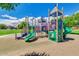 Brightly colored playground equipment offers Gathering fun on a sunny day at 43298 W Delia Blvd, Maricopa, AZ 85138