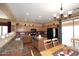 Well-appointed kitchen with ample cabinetry and a center island adjacent to the dining area at 45558 W Mountain View Rd, Maricopa, AZ 85139