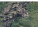 Aerial view of 3B Ranch surrounded by Tonto National Forest and Top-of-the-World with nearby highway access at 51238 N Pinal Ranch Rd, Miami, AZ 85539