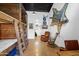 Bedroom showcasing rustic bunk beds and interesting decor, complemented by natural light at 51238 N Pinal Ranch Rd, Miami, AZ 85539