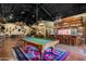 Recreation room showcases a pool table, bar, taxidermy, and stylish decor at 51238 N Pinal Ranch Rd, Miami, AZ 85539