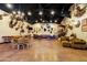Large game room with a pool table and a diverse collection of taxidermy mounts at 51238 N Pinal Ranch Rd, Miami, AZ 85539