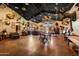 Expansive game room with a bar, pool table, seating and an impressive taxidermy collection at 51238 N Pinal Ranch Rd, Miami, AZ 85539
