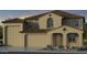 Stunning two-story home with a tile roof and a spacious three-car garage at 5124 W Top Hand Trl, Laveen, AZ 85339
