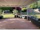 Covered patio, desert landscaping, and view of a backyard area, perfect for outdoor relaxation at 6820 E Pinchot Ave, Scottsdale, AZ 85251