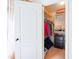 Well-organized walk-in closet with shelving, hanging rods, and dresser for optimal storage at 896 E Dragon Fly Rd, San Tan Valley, AZ 85143