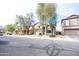 Beautiful home featuring mature trees, a neutral color scheme, and well-maintained landscaping at 896 E Dragon Fly Rd, San Tan Valley, AZ 85143