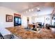 Kitchen island features granite counters and stainless steel sink, offering ample space at 896 E Dragon Fly Rd, San Tan Valley, AZ 85143