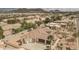 Lovely single-story home featuring an extended driveway, desert landscaping, and an attached three-car garage at 9612 W Mariposa Grande --, Peoria, AZ 85383