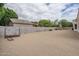Wide angle view of the backyard with mature trees and fence at 9612 W Mariposa Grande --, Peoria, AZ 85383