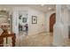 Welcoming entryway showcasing intricate tile flooring and a decorative arched wooden door at 9612 W Mariposa Grande --, Peoria, AZ 85383