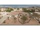 Stunning single-story home featuring stone accents, a tile roof, and desert landscaping for an inviting curb appeal at 9612 W Mariposa Grande --, Peoria, AZ 85383