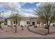 Beautiful single-story home with stone accents, a tile roof, and desert landscaping at 9612 W Mariposa Grande --, Peoria, AZ 85383