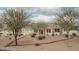 Beautiful front yard with desert landscaping and mature trees at 9612 W Mariposa Grande --, Peoria, AZ 85383