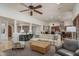 Expansive living area with seamless transitions to the dining and kitchen spaces at 9612 W Mariposa Grande --, Peoria, AZ 85383