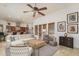 Spacious living room with an open concept layout flowing into the kitchen, perfect for entertaining at 9612 W Mariposa Grande --, Peoria, AZ 85383