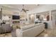 Bright and airy living area featuring an open layout, fireplace, and elegant furnishings at 9612 W Mariposa Grande --, Peoria, AZ 85383