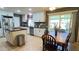 Beautifully updated kitchen with stainless steel appliances, a center island, and ample counter space at 9814 W Shasta Dr, Sun City, AZ 85351