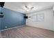 Bedroom featuring light walls, ceiling fan, and window at 107 Leisure World --, Mesa, AZ 85206