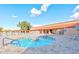 Outdoor community pool area featuring a spa and many lounge chairs for residents at 107 Leisure World --, Mesa, AZ 85206