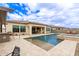 Sparkling pool, and covered patio create a perfect outdoor entertaining space at 11721 W Parkway Ln, Avondale, AZ 85323