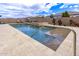 Amazing backyard featuring a sparkling pool and spa with plenty of space for outdoor enjoyment at 11721 W Parkway Ln, Avondale, AZ 85323