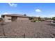 Backyard exterior view with low maintenance desert landscaping and rock ground cover at 13235 W Ashwood Dr, Sun City West, AZ 85375