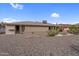 Exterior backyard featuring desert landscaping, rock ground cover and mature cactus at 13235 W Ashwood Dr, Sun City West, AZ 85375