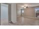 Bedroom featuring neutral walls, wood-look flooring, and windows with view at 13235 W Ashwood Dr, Sun City West, AZ 85375