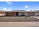 Charming single-story home featuring desert landscaping, brick accents and a two-car garage at 13235 W Ashwood Dr, Sun City West, AZ 85375