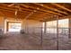 Large open barn with sturdy metal stalls and ample space for equipment or livestock at 16835 E Skinner Dr, Rio Verde, AZ 85263