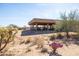 Open air barn with desert landscape and surrounding vegetation on a bright day at 16835 E Skinner Dr, Rio Verde, AZ 85263