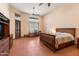 Spacious bedroom featuring a ceiling fan and big windows, bringing light to the room at 16835 E Skinner Dr, Rio Verde, AZ 85263