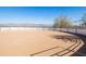 Outdoor horse arena with sand footing and perimeter fencing, designed for training and riding activities at 16835 E Skinner Dr, Rio Verde, AZ 85263