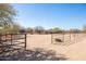 Sturdy horse fence surrounds a spacious enclosure featuring desert landscape and mountain views at 16835 E Skinner Dr, Rio Verde, AZ 85263