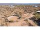 Aerial view of a horse pen on the property with the house in the background at 16835 E Skinner Dr, Rio Verde, AZ 85263