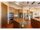 Kitchen featuring granite counters, stainless steel appliances, and custom wood cabinets at 16835 E Skinner Dr, Rio Verde, AZ 85263