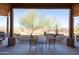 Comfortable outdoor seating on the covered patio overlooking the desert landscape at 16835 E Skinner Dr, Rio Verde, AZ 85263