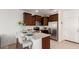 Stylish kitchen with stainless steel appliances and an eat-in breakfast bar at 1950 N Center St # 111, Mesa, AZ 85201