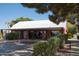 Single-story red brick building with a white roof and well-maintained landscaping at 20212 E Appaloosa Dr, Queen Creek, AZ 85142