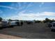 RV parking lot with gravel and a variety of different RVs at 20212 E Appaloosa Dr, Queen Creek, AZ 85142