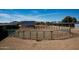 Circular training ring provides a secure area for equestrian activities set against a mountain backdrop at 20212 E Appaloosa Dr, Queen Creek, AZ 85142